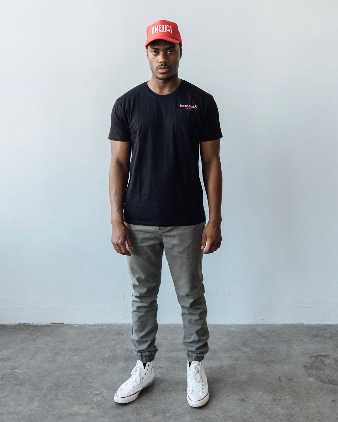 Barnabas TAGLINEPremium Pocket Unisex Tee Barnabas Clothing Co
